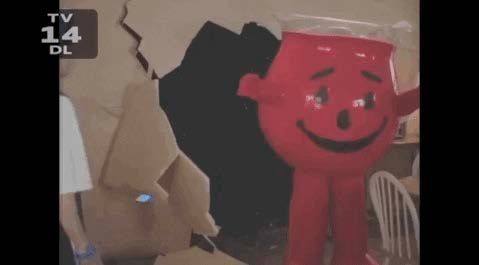 The Kool-Aid Man meme: the red pitcher mascot bursting through a wall, used here as a joke about arriving uninvited.