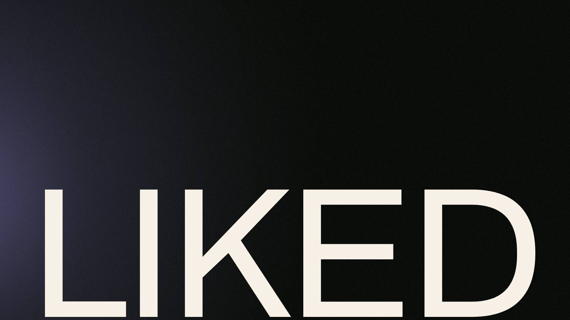 The single word "liked" at poster scale, cropped by the right and bottom edges of the frame, over a dark field with lilac light entering from the left.