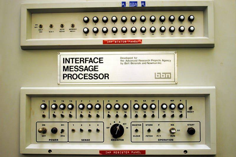 The front panel of a BBN Interface Message Processor, the first ARPANET node: cream steel, two rows of toggle switches, and a maker's plate reading Interface Message Processor, developed for the Advanced Research Projects Agency.
